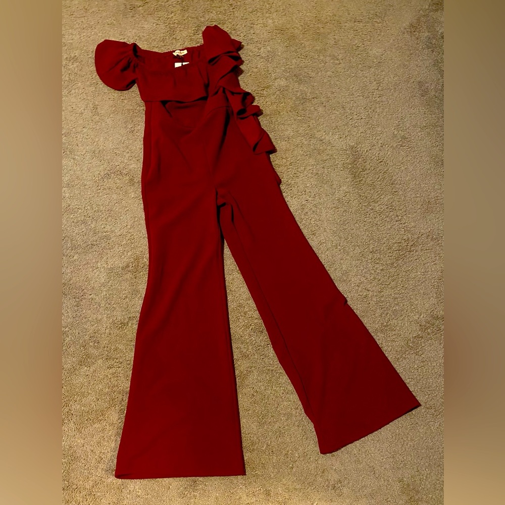 Burgundy jumper. Off the shoulder, ruffle, never worn, new with tags.